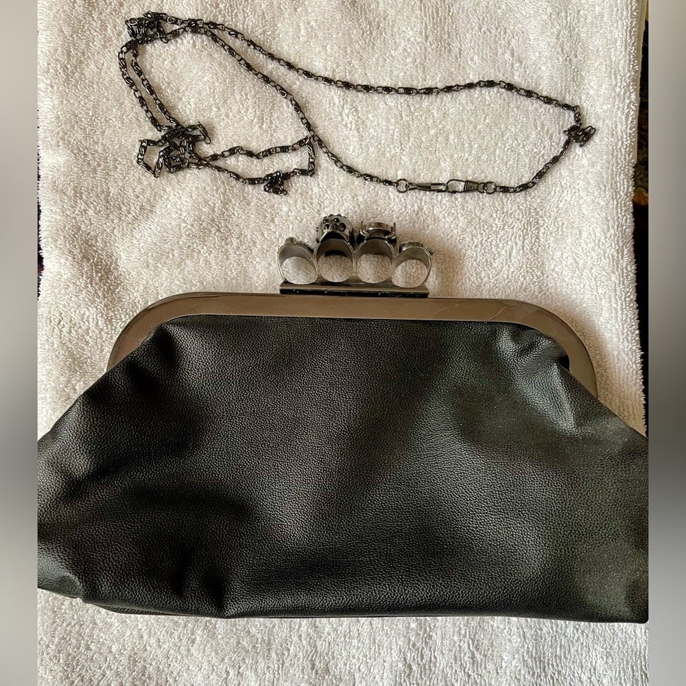 Black clutch. Very cool. Brand new.